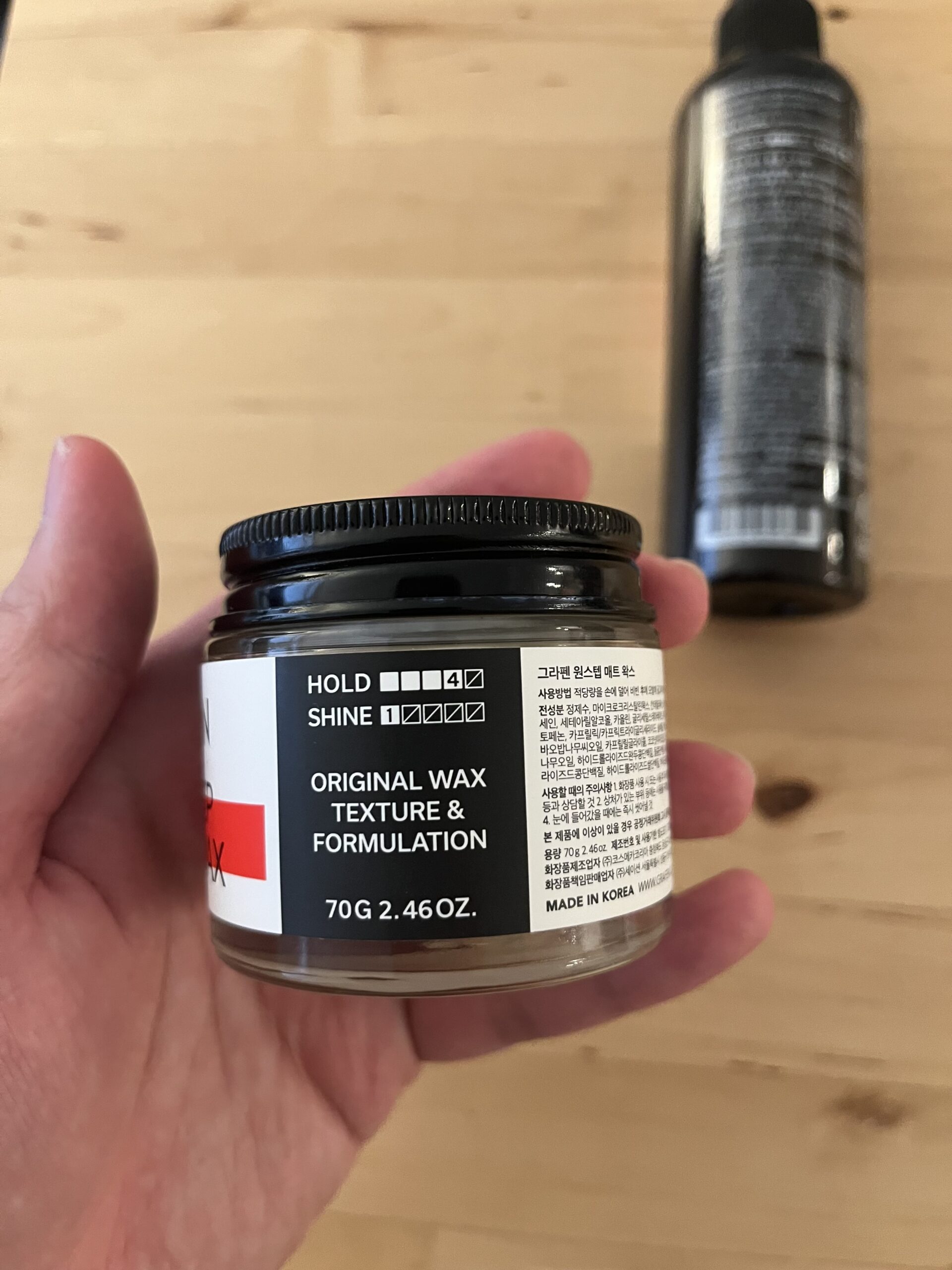 The jar shows HOLD 4 and SHINE 1, an original wax texture formulation, 70g